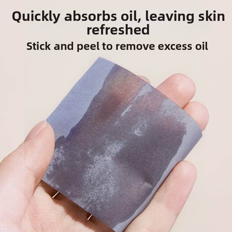 Portable facial oil-absorbing paper with puff and mirror case