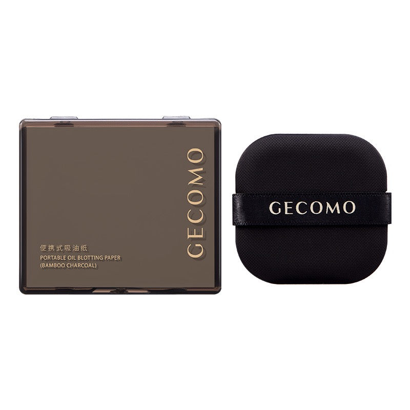 Portable facial oil-absorbing paper with puff and mirror case